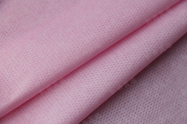 Colourful elastic non-woven fabric
